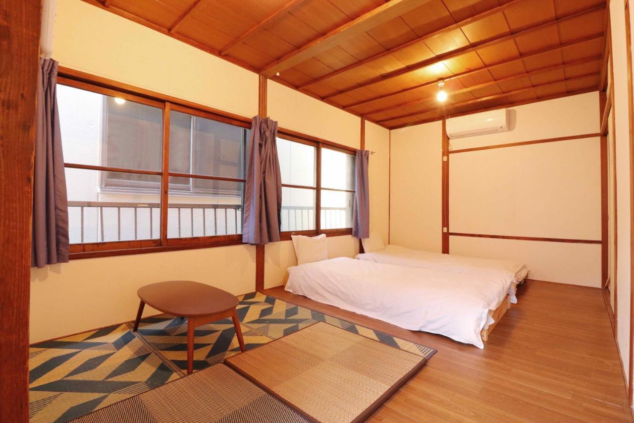 ゲストハウス おしてるや Self Check-In Osaka Bagian luar foto
